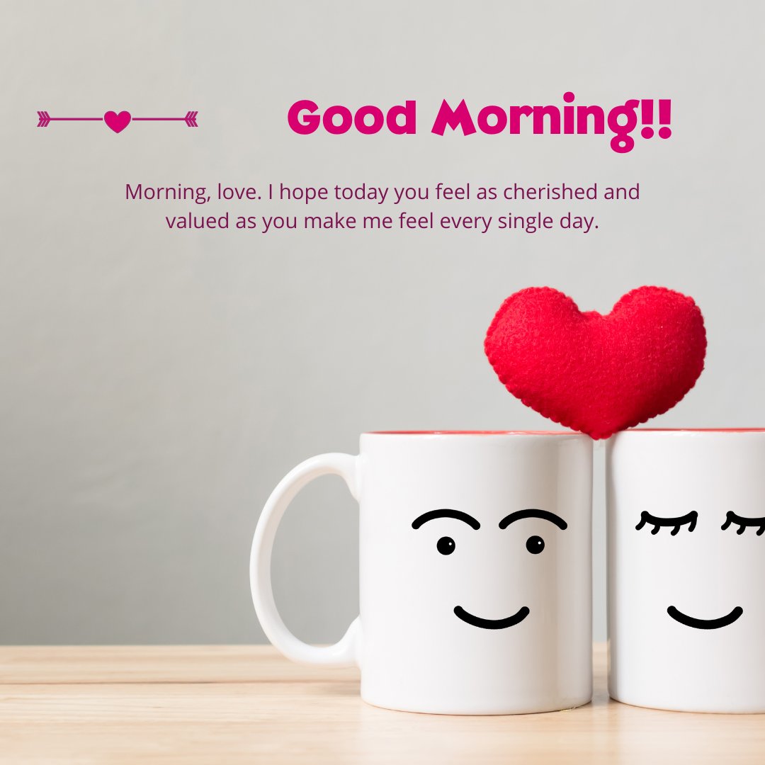 Two white mugs with smiling faces, one with eyes open and the other with eyes closed, on a wooden surface. A red plush heart rests on top of the mugs, with a caption saying 'Good Morning!! Morning, love. I hope today you feel as cherished and valued as you make me feel every single day.' This cozy image is perfect for sending good morning messages for boyfriend.